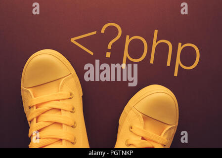 PHP programmer, conceptual image with sneakers from above Stock Photo