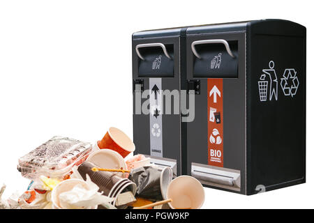 Garbage next to a modern garbage can. The concept is protected by nature and the environment. Stock Photo