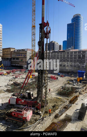 Global project of urban re-development: drilling machine at work on a building site, Part-Dieu district, Lyon, France Stock Photo