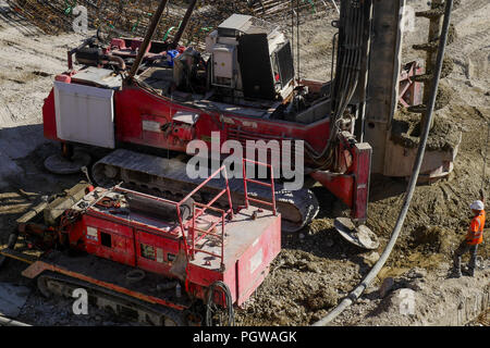 Global project of urban re-development: drilling machine at work on a building site, Part-Dieu district, Lyon, France Stock Photo