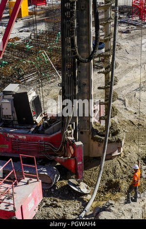 Global project of urban re-development: drilling machine at work on a building site, Part-Dieu district, Lyon, France Stock Photo