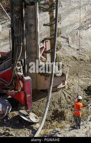 Global project of urban re-development: drilling machine at work on a building site, Part-Dieu district, Lyon, France Stock Photo