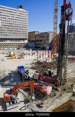 Global project of urban re-development: drilling machine at work on a building site, Part-Dieu district, Lyon, France Stock Photo