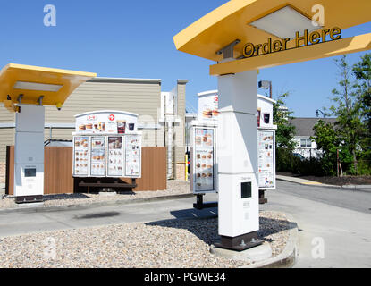 McDonald's drive thru ordering with menus and no cars. Hyannis, Cape Cod, Massachusetts USA Stock Photo