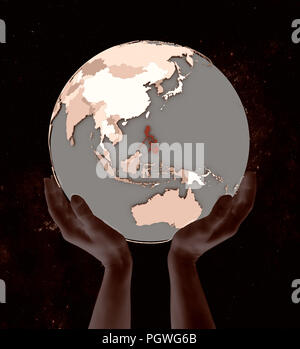 Philippines on globe in hands in space. 3D illustration. Stock Photo