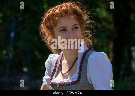 Girl with braided hairstyle and dirndl, Upper Bavaria, Bavaria, Germany Stock Photo