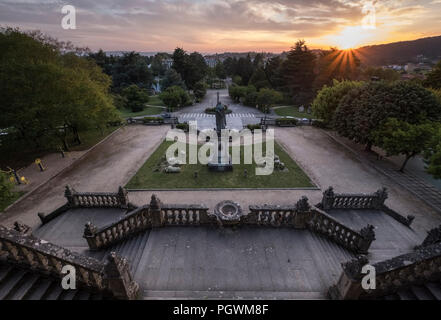 Stairway with statue in park Parque de la Alameda, sunset, Santiago de Compostela, Galicia, Spain Stock Photo