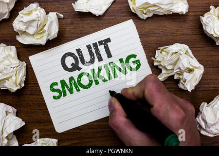 Conceptual hand writing showing Quit Smoking. Business photo showcasing Discontinuing or stopping the use of tobacco addiction Man holding marker note Stock Photo