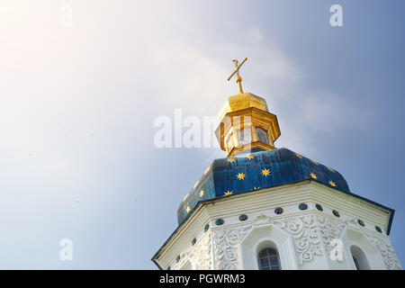 Blue dome with stars and golden cross of Kiev Pechersk Lavra. Old historical architecture in Kiev, Ukraine Stock Photo