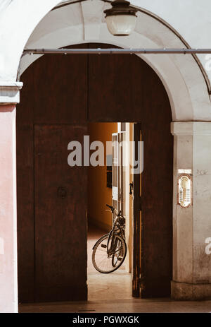 old bike in a old house somewhere in italy. Stock Photo