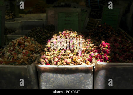 Dried rose buds on sale in a stall in a market Stock Photo