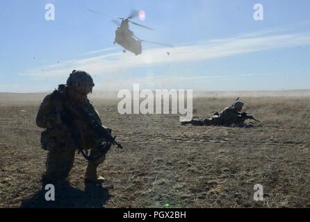 U.S. Soldiers with 3rd Battalion, 116th Field Artillery Regiment were ...