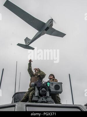 A U.S. Army unit launches an unmanned aerial system (UAS) during field ...