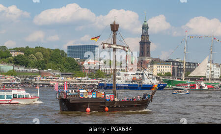 Ships on the river Elbe in front of St. Pauli Piers, Port of Hamburg, behind the church of St. Michael Michel, Hamburg, Germany Stock Photo