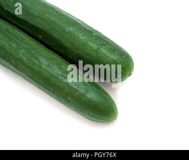 Two green cucumbers on isolated white background Stock Photo
