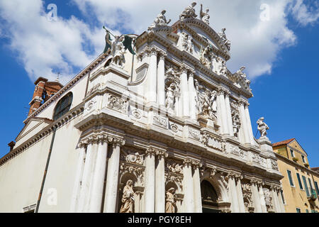 VENICE, ITALY - AUGUST 14, 2017: Santa Maria del Giglio, baroque church facade in a sunny summer day, blue sky in Italy Stock Photo