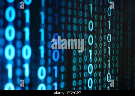 computer data matrix. vertical digital binary code moving motion downward. light up blue one and zero text flowing down. black background space with m Stock Photo