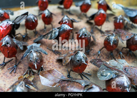 Decorative Metal Birds for Outdoor Garden on the Table in Store Stock Photo