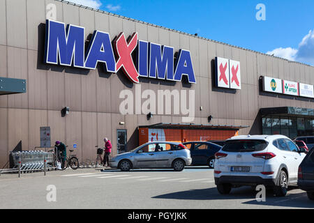 KURESSAARE, ESTONIA - CIRCA MAR, 2018: Food Supermarket Maxima XX is in center of city. Main entrance and logo. It is one of the largest shops is on S Stock Photo
