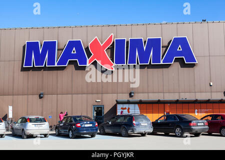 KURESSAARE, ESTONIA - CIRCA MAR, 2018: Building of supermarket Maxima XX is in center of city. Main entrance and logo. It is one of the largest shops  Stock Photo