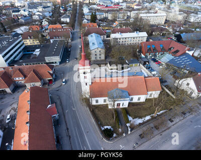 KURESSAARE, ESTONIA-CIRCA MAR, 2018: Kuressaare Saint Lawrence church building is in center of city. Aerial view. Saaremaa island, Estonia, Europe Stock Photo