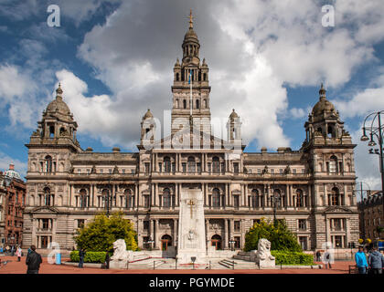 Glasgow, Scotland, UK - May 21, 2011: Sun shines on the Beaux-Arts facade of Glasgow City Chambers in George Square. Stock Photo