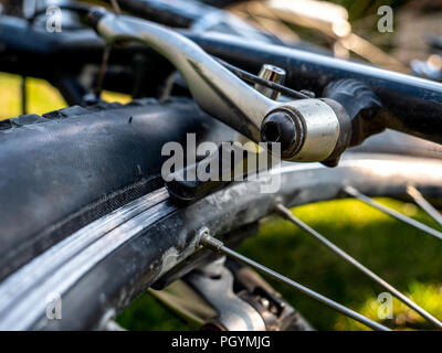 braking system at a mountain bike close up dirty bike Stock Photo