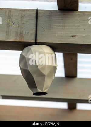 artificial wasp nest to keep them away 3d printed lookalike homemade Stock Photo