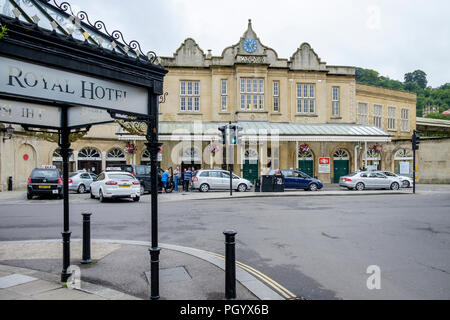 Taxi's are pictured waiting outside the front entrance of Bath Spa railway station / train station Stock Photo