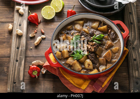 Thai Beef Massaman Curry, dark background copy space Stock Photo
