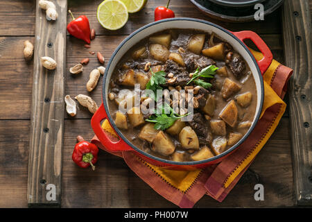 Thai Beef Massaman Curry, dark background copy space Stock Photo