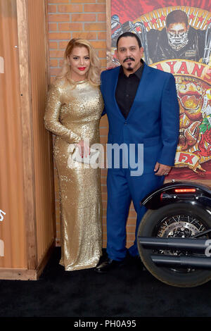 Yadi Valerio Rivera and Emilio Rivera attending the premiere of FX's 'Mayans M.C.' at TCL Chinese Theatre on August 28, 2018 in Hollywood, California. Stock Photo