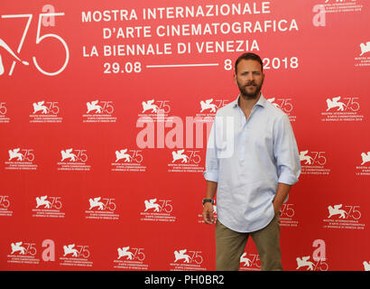 Venice, Italy. 29th Aug, 2018. Actor Alessandro Borghi poses for photos during the photocall of the movie 'Sulla Mia Pelle (On My Skin)' at the 75th Venice International Film Festival in Venice, Italy, Aug. 29, 2018. Credit: Cheng Tingting/Xinhua/Alamy Live News
