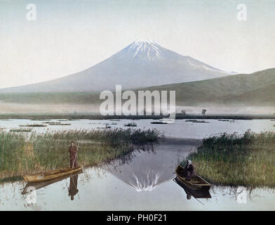 [ 1890s Japan - Two Boats on a Lake near Mount Fuji ] —   View of Mt. Fuji from Ukishimanuma near Kashiwabara-Shinden in Fuji City, Shizuoka Prefecture. Two small boats can be seen in the foreground. Mt. Fuji is beautifully reflected in the water.  19th century vintage albumen photograph.