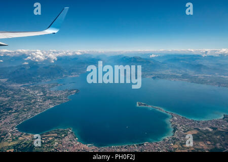 Lake Garda seen from an aircraft showing the full length of the lake Stock Photo