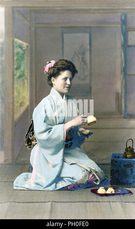 [ 1880s Japan - Western Woman in Kimono ] —   Western woman posing in Japanese kimono. During the late 1800s and early 1900s, it was very popular for Westerners to have themselves photographed in Japanese clothing and settings.  19th century vintage albumen photograph. Stock Photo