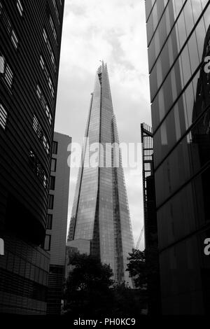 The Shard, London Bridge.  The Shard is a 95-story skyscraper designed by Renzo Piano.  The Shard is the fourth tallest building in Europe at 309.7m. Stock Photo