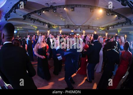 Guests participate in dancing during the 243rd Army Birthday Ball at the Washington Hilton Hotel in Washington, D.C., June 16, 2018. Stock Photo