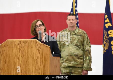 Oregon Governor Kate Brown speaks during a ceremony to mark the signing of House Bill 4035 June 16, 2018 at Kingsley Field in Klamath Falls, Oregon.  House Bill 4035 authorizes state tuition assistance for service members in the Oregon National Guard. Stock Photo