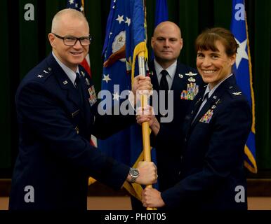 Col. Bradley Pyburn, 67th Cyberspace Wing commander, listens to Maj ...