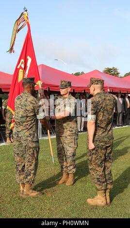 Brig. Gen. Joseph F. Shrader assumes command of Marine Corps Logistics Command from Maj. Gen. Craig C. Crenshaw during a change of command ceremony held at Schmidt Field aboard Marine Corps Logistics Base Albany, Ga., June 14. Stock Photo