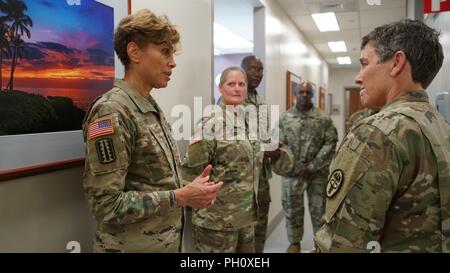 HONOLULU, Hawaii (June 21, 2018) -- The Army Surgeon General and U.S. Army Medical Command (MEDCOM) Commanding General, Lt. Gen. Nadja West, toured the Dental Health Command Pacific (DHC-P) headquarters during a visit to the Regional Health Command-Pacific area of operation, discussing various topics, to include Soldier development. Stock Photo