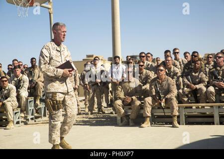 HELMAND PROVINCE, Afghanistan (June 19, 2018) - U.S. Marine Corps Sgt. Maj. William T. Thurber, the sergeant major for Marine Corps Forces Central Command, addresses the service members with Task Force Southwest (TFSW). Lt. Gen. William D. Beydler, the commanding general for Marine Corps Forces Central Command, and Thurber visited Camp Shorab to show their appreciation to TFSW for the work they’ve done in Helmand Province. Stock Photo