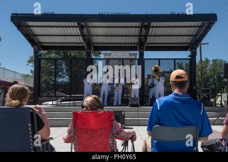 CARSON CITY, Nev. (June 23, 2018) Sailors assigned to Navy Band Southwest perform at McFadden Plaza Stage in support of Reno/Carson City Navy Week.  The Navy Office of Community Outreach uses the Navy Week program to bring Navy Sailors, equipment and displays to approximately 15 American cities each year for a week-long schedule of outreach engagements. Stock Photo