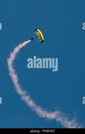 CARSON CITY, Nev. (June 23, 2018) The U.S. Navy Parachute Team, the Leap Frogs, perform a parachute demonstration during Reno/Carson City Navy Week. The Navy Office of Community Outreach uses the Navy Week program to bring Navy Sailors, equipment and displays to approximately 15 American cities each year for a week-long schedule of outreach engagements. Stock Photo