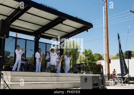 CARSON CITY, Nev. (June 23, 2018) Sailors assigned to Navy Band Southwest perform at McFadden Plaza Stage in support of Reno/Carson City Navy Week.  The Navy Office of Community Outreach uses the Navy Week program to bring Navy Sailors, equipment and displays to approximately 15 American cities each year for a week-long schedule of outreach engagements. Stock Photo