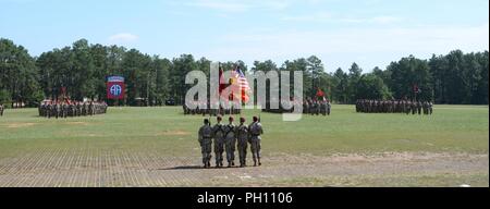 Paratroopers of the 82nd Airborne Division Artillery, 82nd Airborne Division await inspection by their new commander, Col. Joe Hilbert, during a change of command ceremony on Fort Bragg, North Carolina, June 22, 2018. The ceremony marked the transfer of authority for the Army’s largest airborne artillery organization. Stock Photo