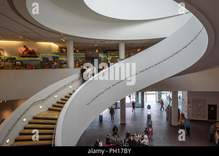 The spiral staircase in the central hall of the museum of Liverpool, Merseyside, England UK, 2018. Stock Photo