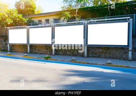 Blank white mockup four billboard in empty Istanbul street Stock Photo