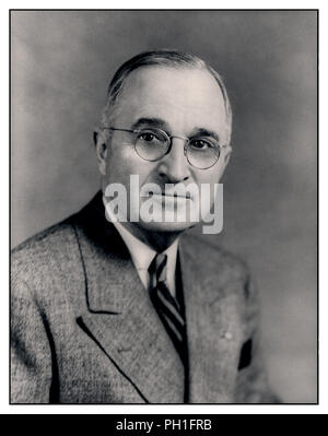 Vintage formal portrait of Democrat Harry S. Truman the 33rd President of the United States, taking office upon the death of Franklin D. Roosevelt. A World War I veteran, he assumed the presidency during the waning months of World War II and the beginning of the Cold War. Stock Photo